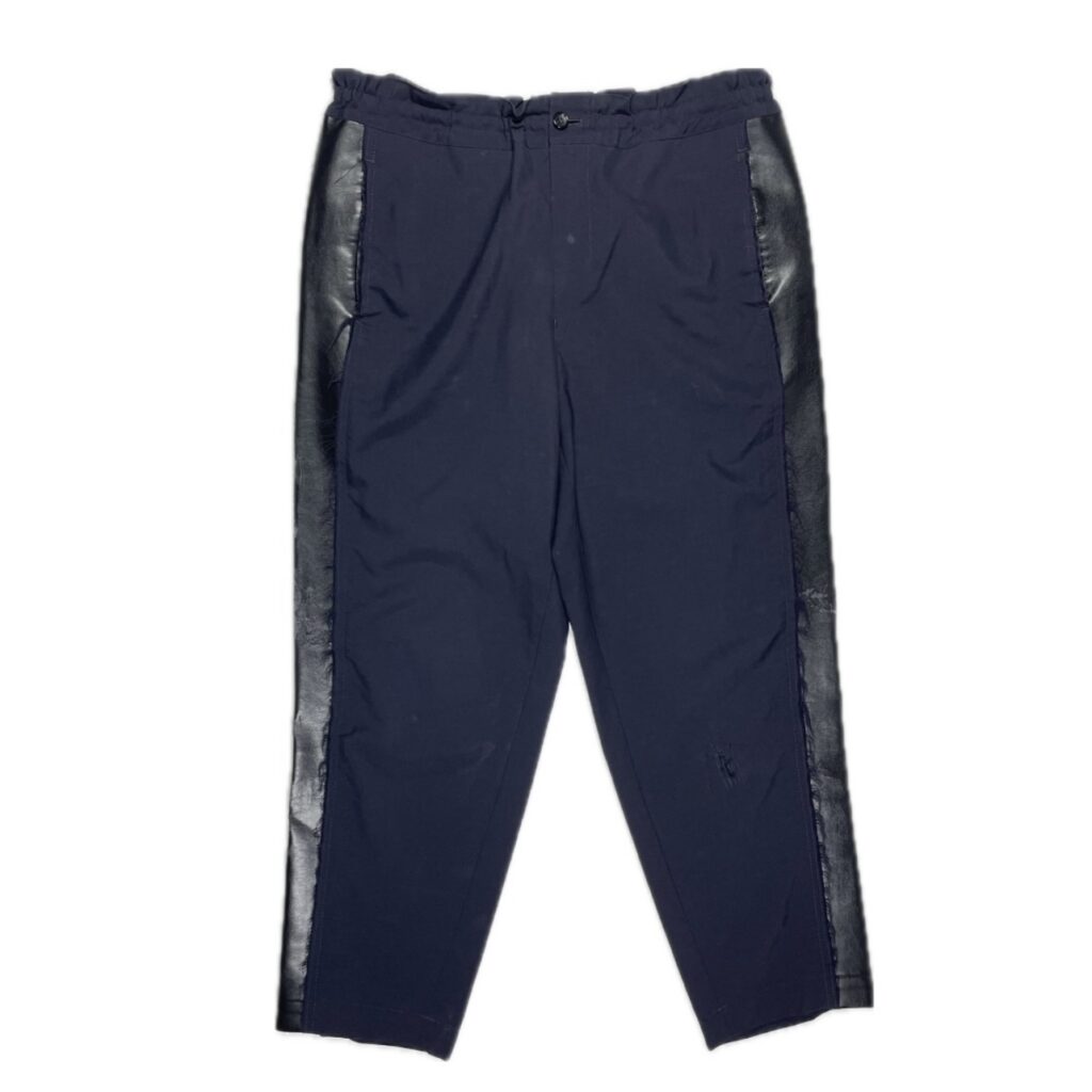 "COMME des GARCONS HOME PLUS DAMAGE DOCKING PANTS"